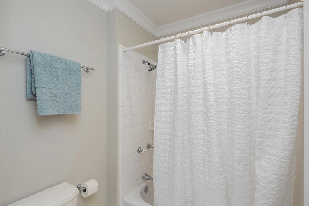 Clean Your Shower Curtain Regularly