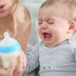 Why is my baby refusing a bottle after breastfeeding?