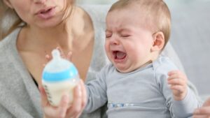 Why is my baby refusing a bottle after breastfeeding?