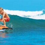 What is the ideal surfboard length for a 12-year-old beginner?