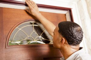 What should I do if my door frame height doesn't match standard sizes