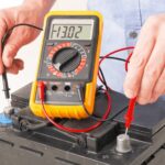 What voltage should a healthy alternator show