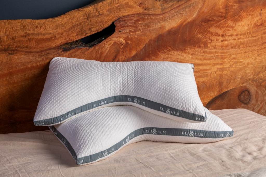Eli & Elm side sleeper pillow with adjustable U-shaped design for neck pain relief