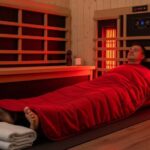 Far infrared sauna blanket used after yoga for muscle recovery and relaxation