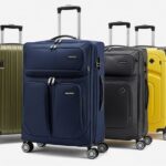 Modern suitcases lined up showing different luggage brand designs and features