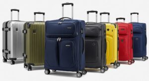 Modern suitcases lined up showing different luggage brand designs and features