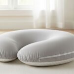 Affordable nursing pillow with firm support and washable cover for comfortable breastfeeding