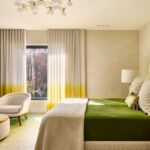Elegant budget curtains covering large living room windows with natural light