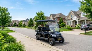 A modern street-legal golf cart parked on a sunny suburban neighborhood street.